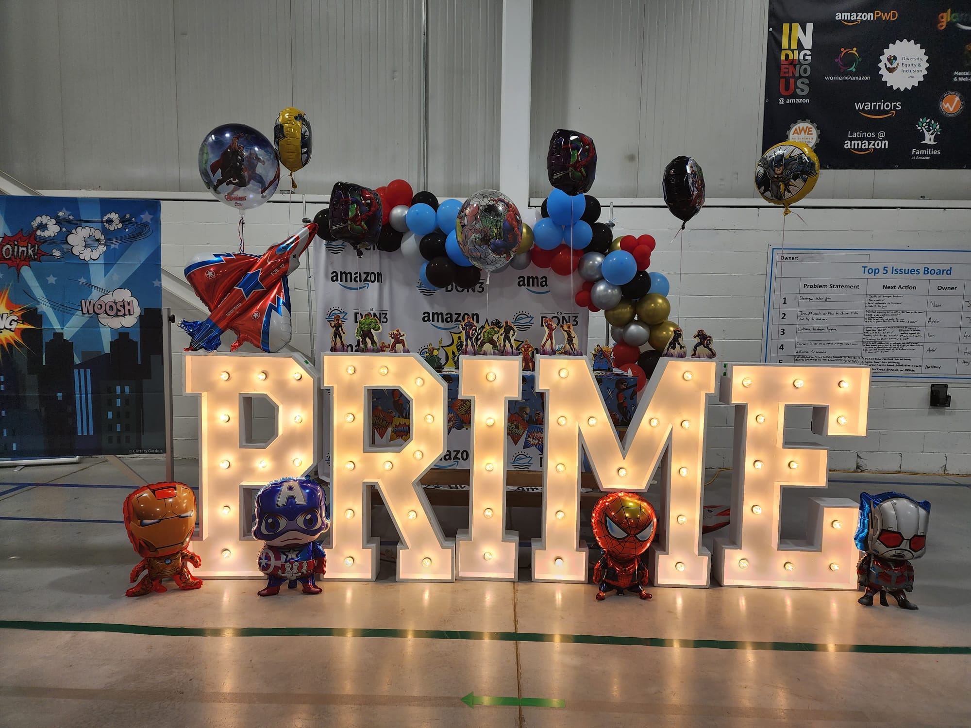 Collingwood marquee letters with balloon decor and superheroes