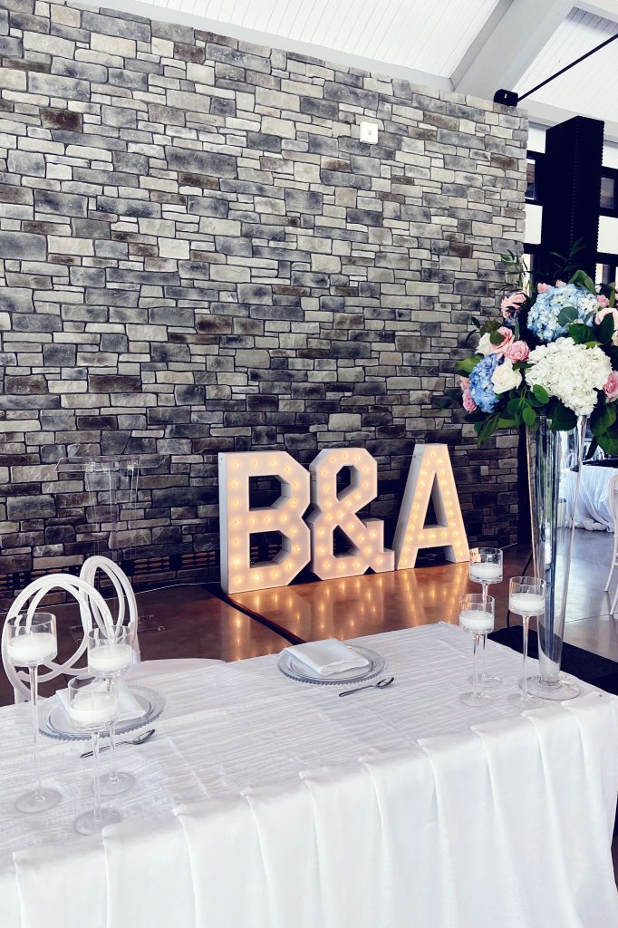 Midland marquee letters that spell out a couple's initials