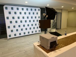 Photo booth pod in Orillia with a corporate backdrop