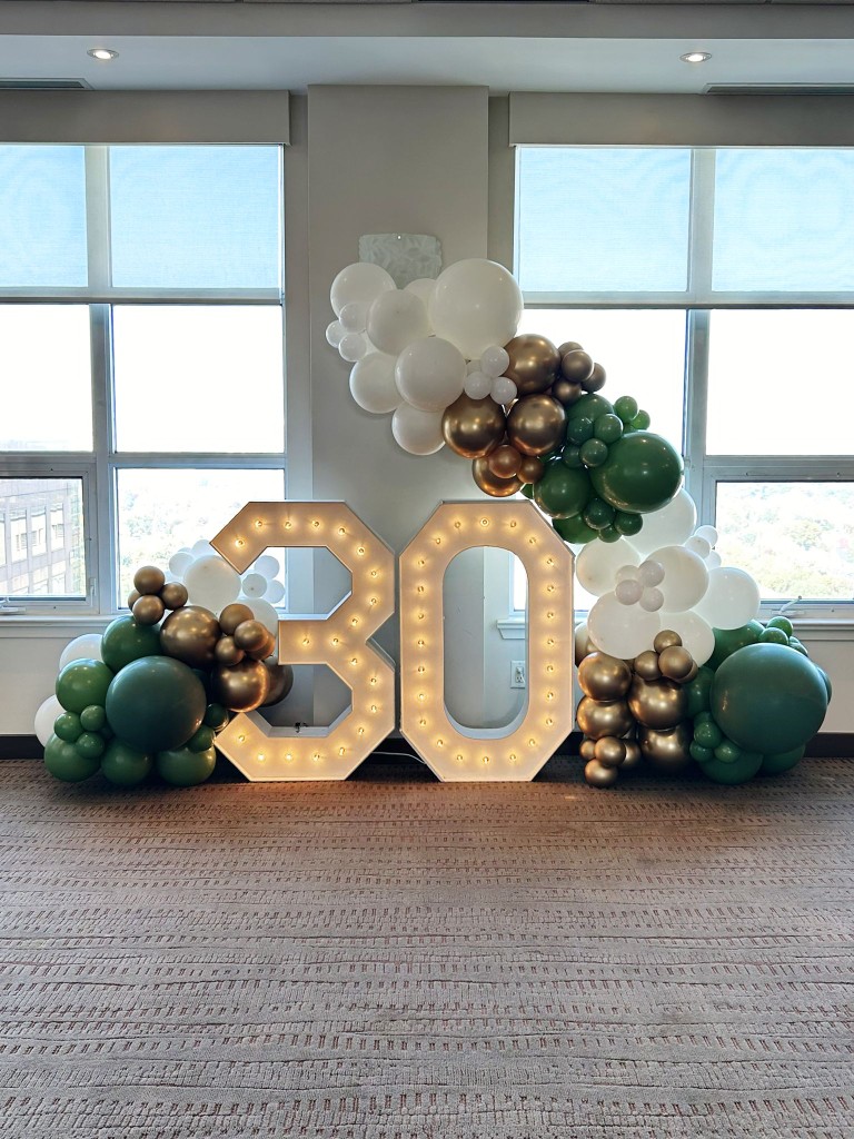Balloon garlands in Ajax, framing the number 30 in marquee numbers